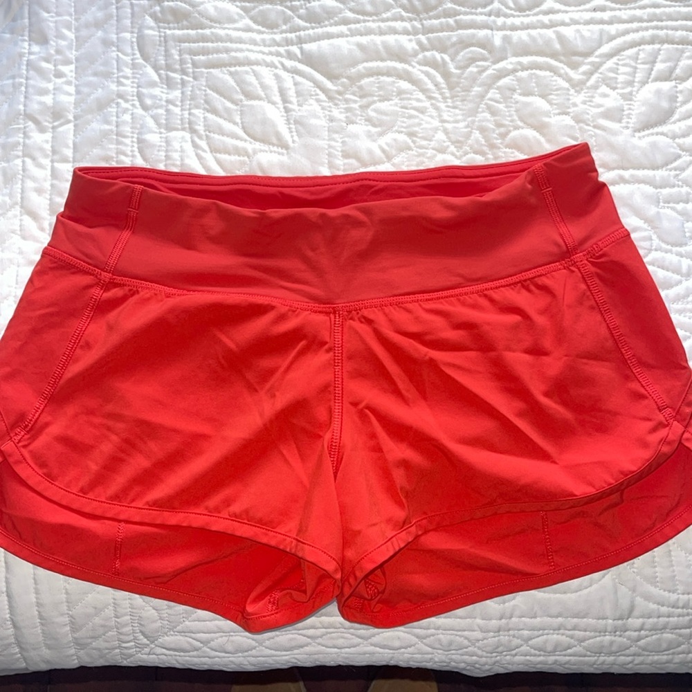 Lululemon Speed Up Short *2.5"
Size 4 Coral/Orange color